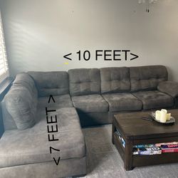 Sectional couch with recliner, used but good conditioned