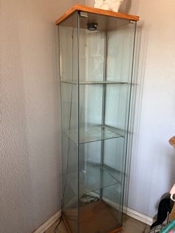 Glass display case with light