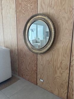 Large round framed mirror