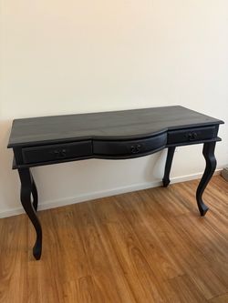 Black writing desk