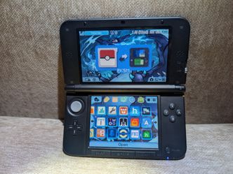 Nintendo 3DS XL Blue - 64gb SD - Charger - CFW