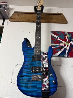 Children learning guitar