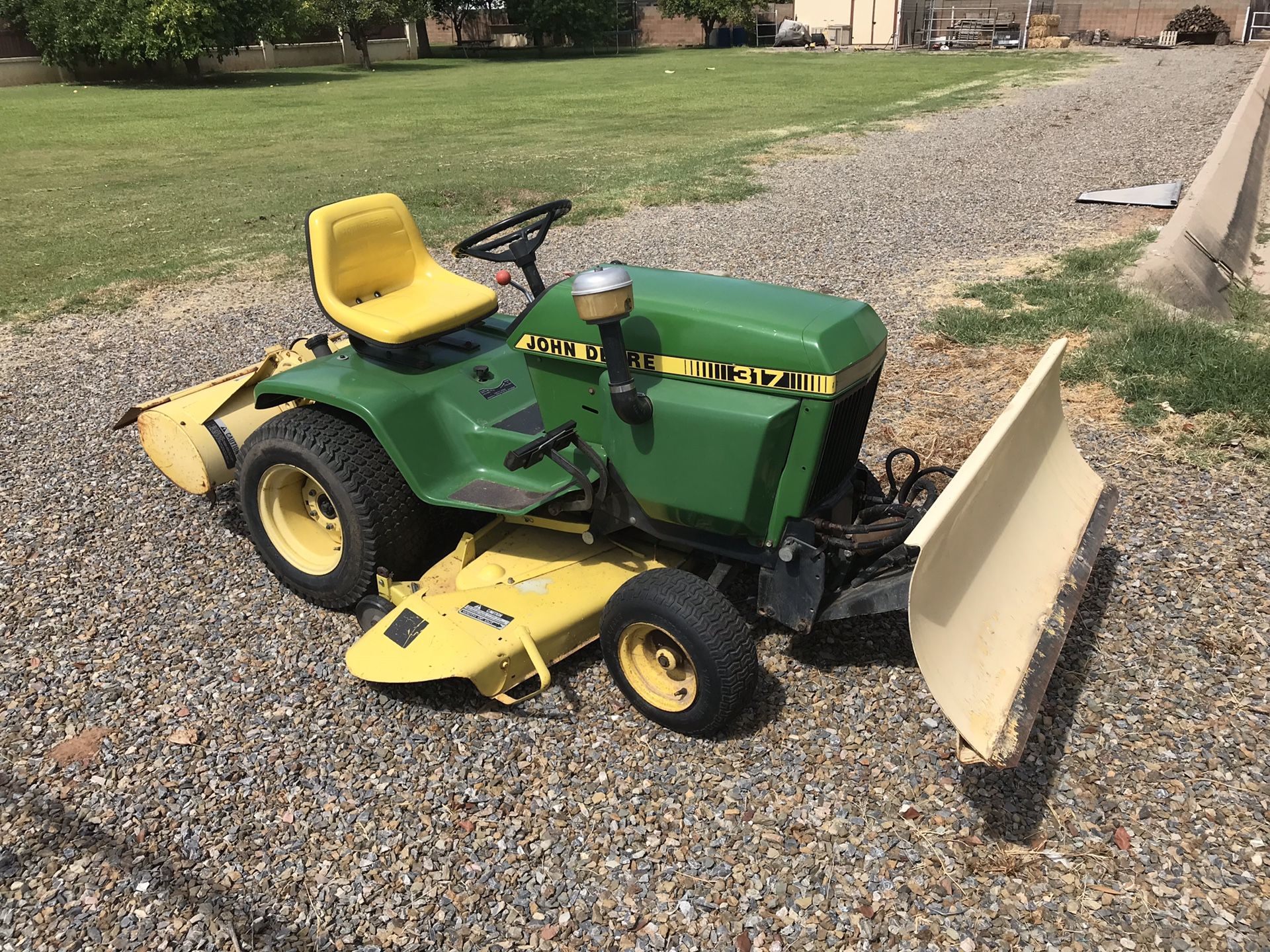 John Deere 317 Garden Tractor with front plow and rear tiller for Sale