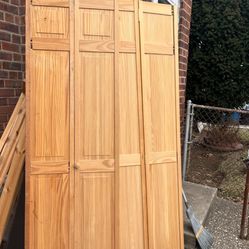 Wood. Panel.    Bi.  Door.   24”X.       2.  Doors.  Is  48” Wide By.  79.5. “”