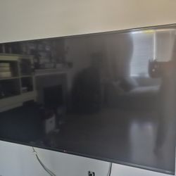 70" LG Ultra HD TV with Wall Mount and 2 LG remotes