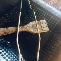 Three BBQ tools,used once and in great shape Container, brush scrapper and tongs.  B