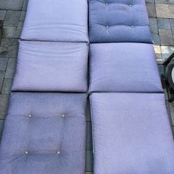 2 Piece Outdoor Patio Furniture Cushions in Purple Blue  Located in concord  Very good condition  No damages Covers not removable   Measures 25” x 72”