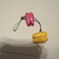 Pink and Yellow Tooth-Shaped Keychains