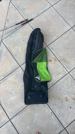 Green and black golf club travel bag (used)