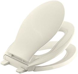 Brand new Kohler toilet seat with child potty seat