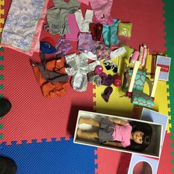 American Girl Doll With A Lot Cloth