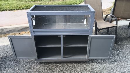 Reptile closure with storage cabinet