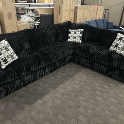 Large And Deep Rich Black Sectional 