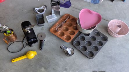 Baking trays , electric can opener , apple cutter , spoon ice creams etc