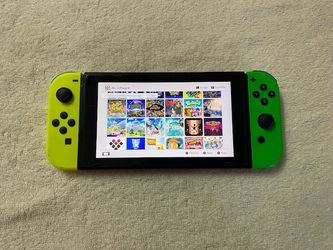 NINTENDO SWITCH + 120 POPULAR SWITCH GAMES INCLUDED