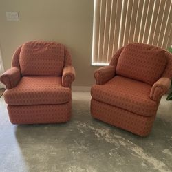 Pair Of Swivel Rocker Arm Chairs 