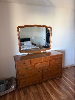 Antique 11 drawer, solid wood dresser with mirror