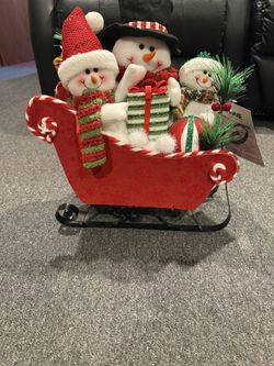 Snowman Family On Sleigh