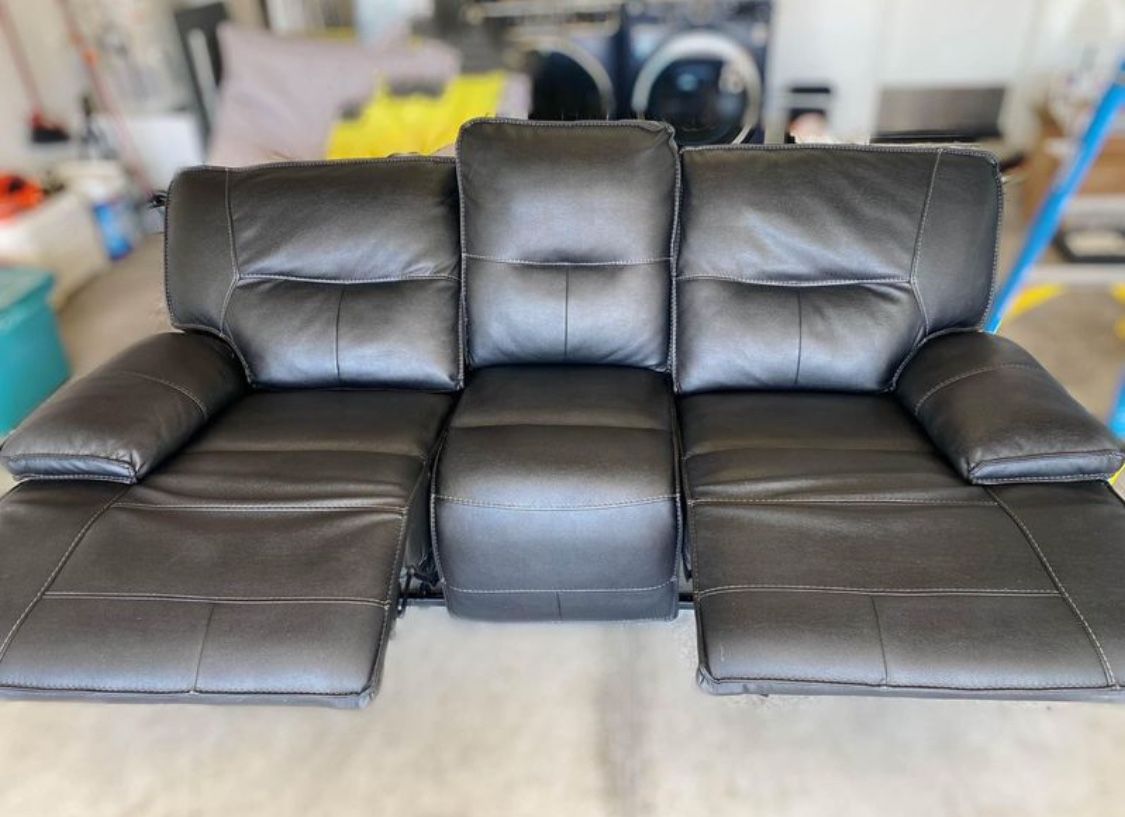 Black leather, electric recliner couch.