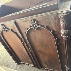 Huge vintage wood dresser armoire with four pullout drawers, and four pullout shelves in the top armoire