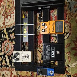 Guitar pedals Boss Ds1 Rat Hot Cake Wah pedal 1 spot pro power system and ghost fire pedal board.