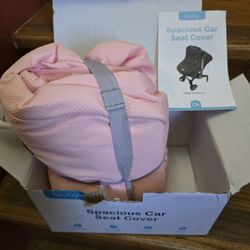 Pink Car Seat Cover NEW $10. PICK-UP in Aurora. 