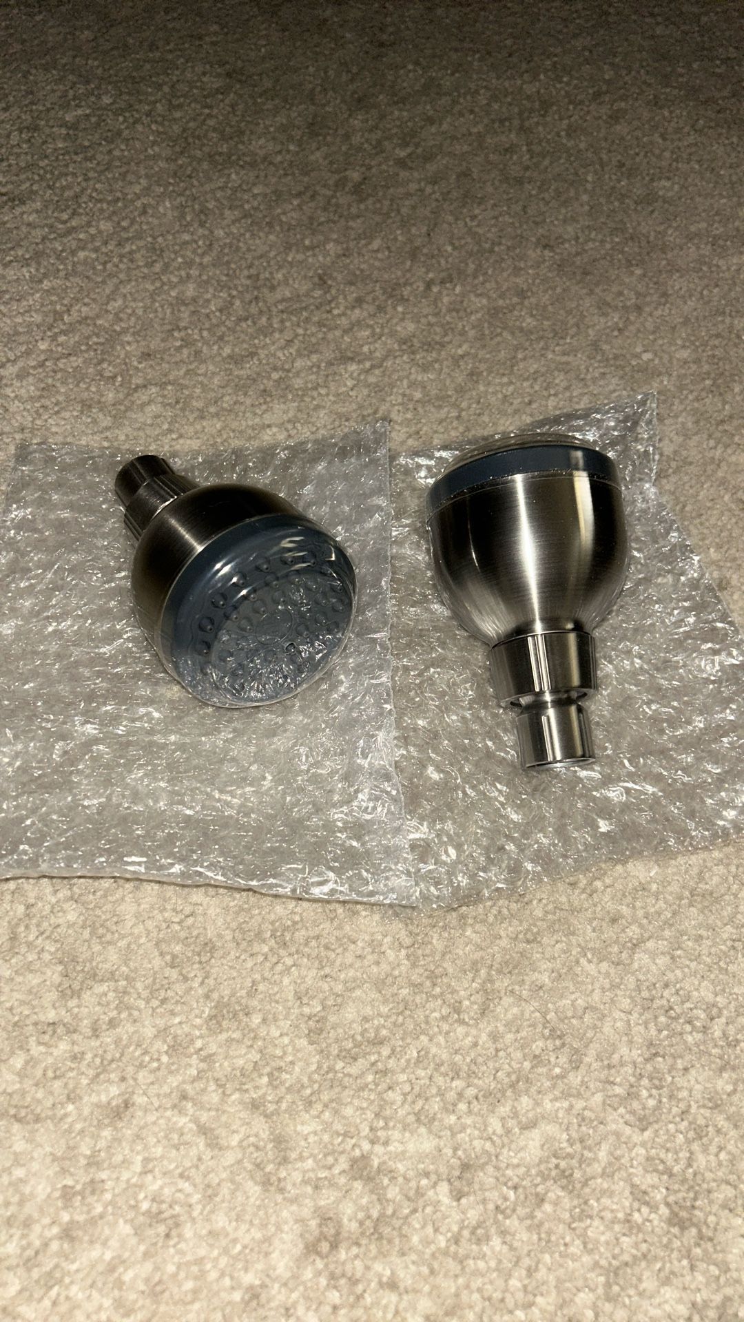 2 New Delta Showerheads.