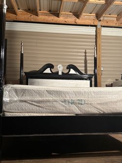 Black king size bed frame, mattresses, and boxspring