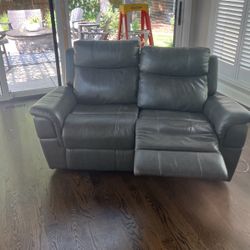 Dual reclining electrical leather loveseat