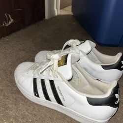 Black & white ADIDAS Size 6.5 Women/5 Men