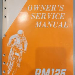1994 Suzuki RM125 Official Workshop Manual Repair Book.