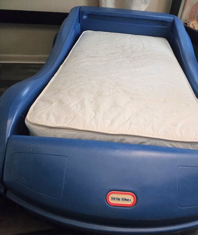 Blue racecar Toddler Bed With Mattress (Mattress Comes With It If Wanted)