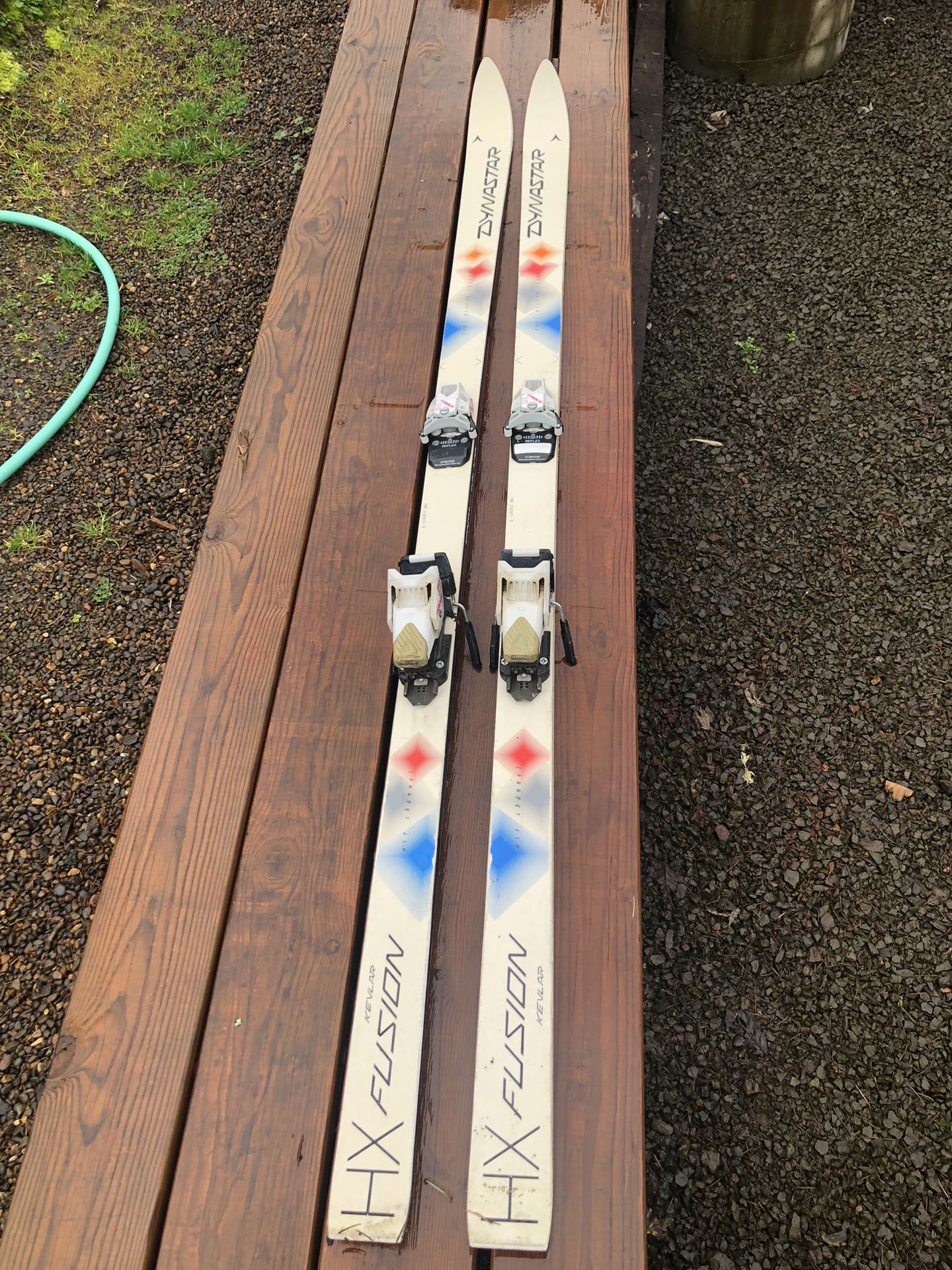 Two Pairs Skis With Bindings And Poles