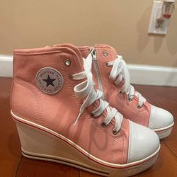 Pink converse wedges. No box but never used and in good condition. Women’s size 7.5 and 3 inch wedge. Pick up only. Price is negotiable.