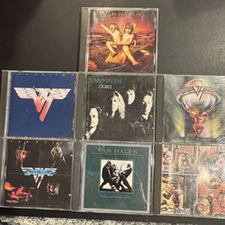 Van Halen CD Lot. 7 cds including OU812, 5150, Women and Children First, Van Halen II, Van Halen Self Titled, Balance, & Fair Warning. CDs all in good