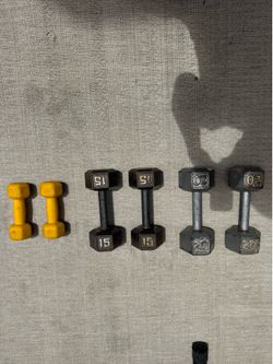 Dumbbells 2x 20lbs, 2x 15 lbs, and 2x 5lbs