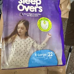 4 Bags Of Baby Diapers