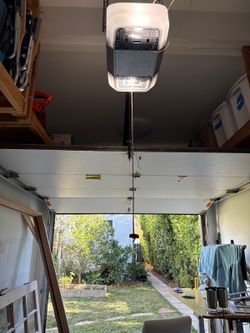 Garage Door Opener Spring Off Track Replace Adjustment And Parts
