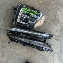 (contact info removed) MITSUBISHI CROSS HEADLIGHTS OEM