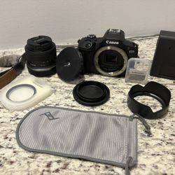 Canon EOS R100 Mirrorless Camera + 18-45mm Lens + Extras (Like New Bundle)