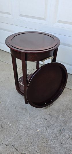 **Round Wood Bar Table with Removable Tray and Rotating Wine Rack**