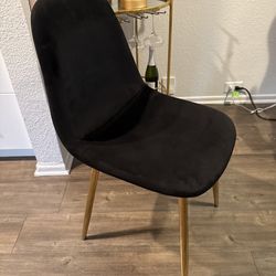 set of 4 black suede and gold dining chairs