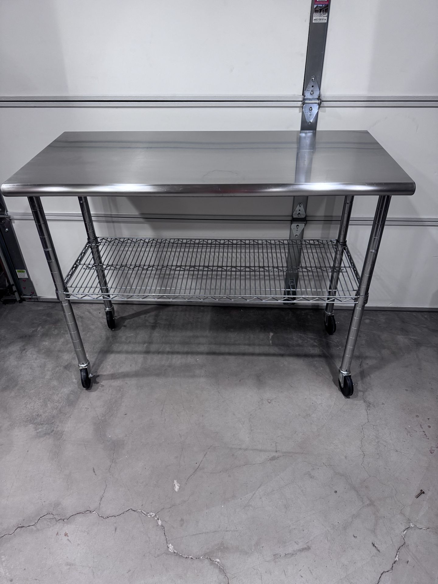 Utility cart with Stainless steel top.