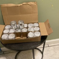 This box contains Volens brand votive candle holders, which are commonly used for decorative purposes like weddings and parties. 