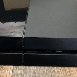 Playstation 4 w/ two controllers