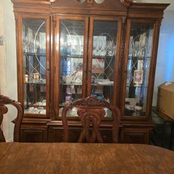 China closet and table with four chairs