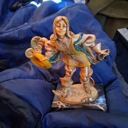 Statue on marble base