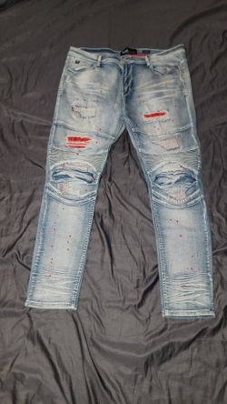 SWITCH REMARKABLE  DISTRESSED DENIM JEANS WITH RED SPOTS