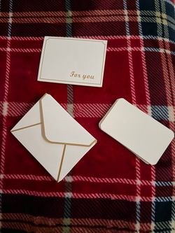 17 mini white and gold envelopes
