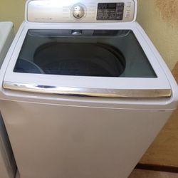 Washer And dryer Plus  an Old Double Bbq Grill
